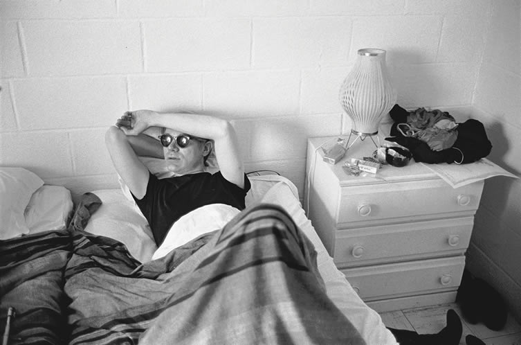 Andy Warhol in hotel room during filming of My Hustler