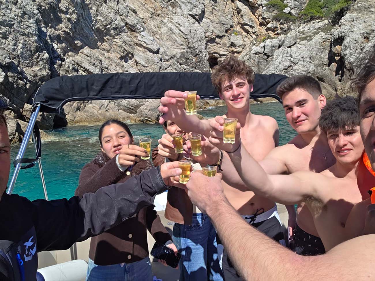 friends celebrating on Dubrovnik Blue Cave Adriatic sea private boat tour experience Croatia drinks onboard