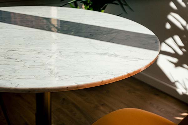 Cult Furniture, Maria Round Marble Dining Table and Heather Velvet Upholstered Chairs