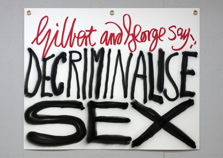 Gilbert & George say-: DECRIMINALISE SEX 1