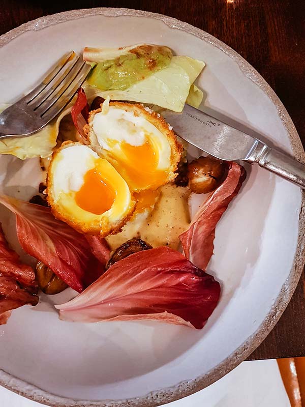 Crispy hen's egg, with cep, Brussels sprouts and chicory