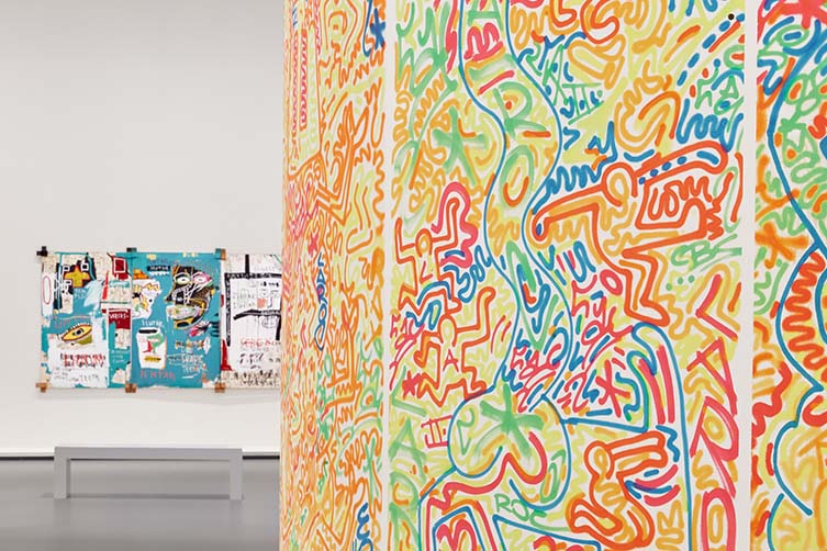 Installation views of Keith Haring | Jean-Michel Basquiat: Crossing Lines at NGV International