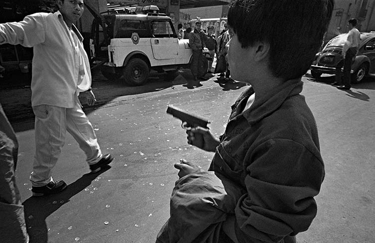 Youth Pointing Gun, Mexico City, 1997