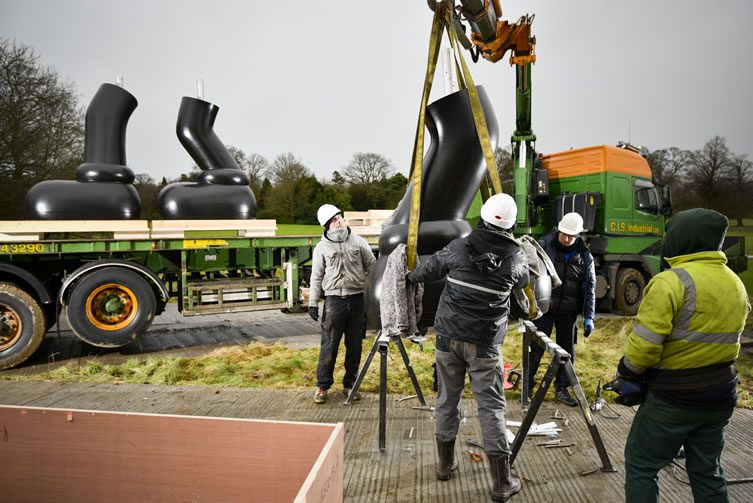 Installation of KAWS sculpture at Yorkshire Sculpture Park