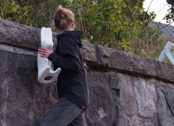 Hanna-Kaarina Heikkilä hiding a City rabbit, Helsinki