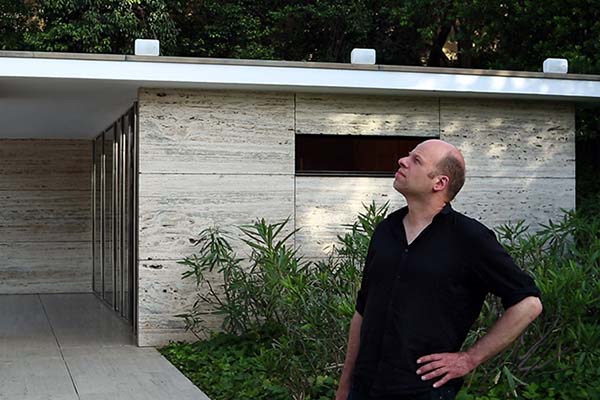 Edwin van der Heide inspecting the 40 loudspeakers installed across the Mies van der Rohe Pavilion's roof for his 2014 sonic intervention, Spectral Diffractions