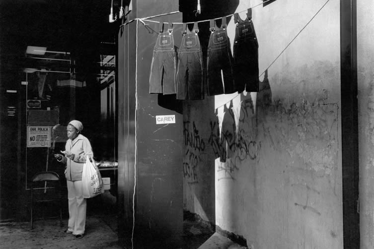 Dawoud Bey, A Woman with Hanging Overalls