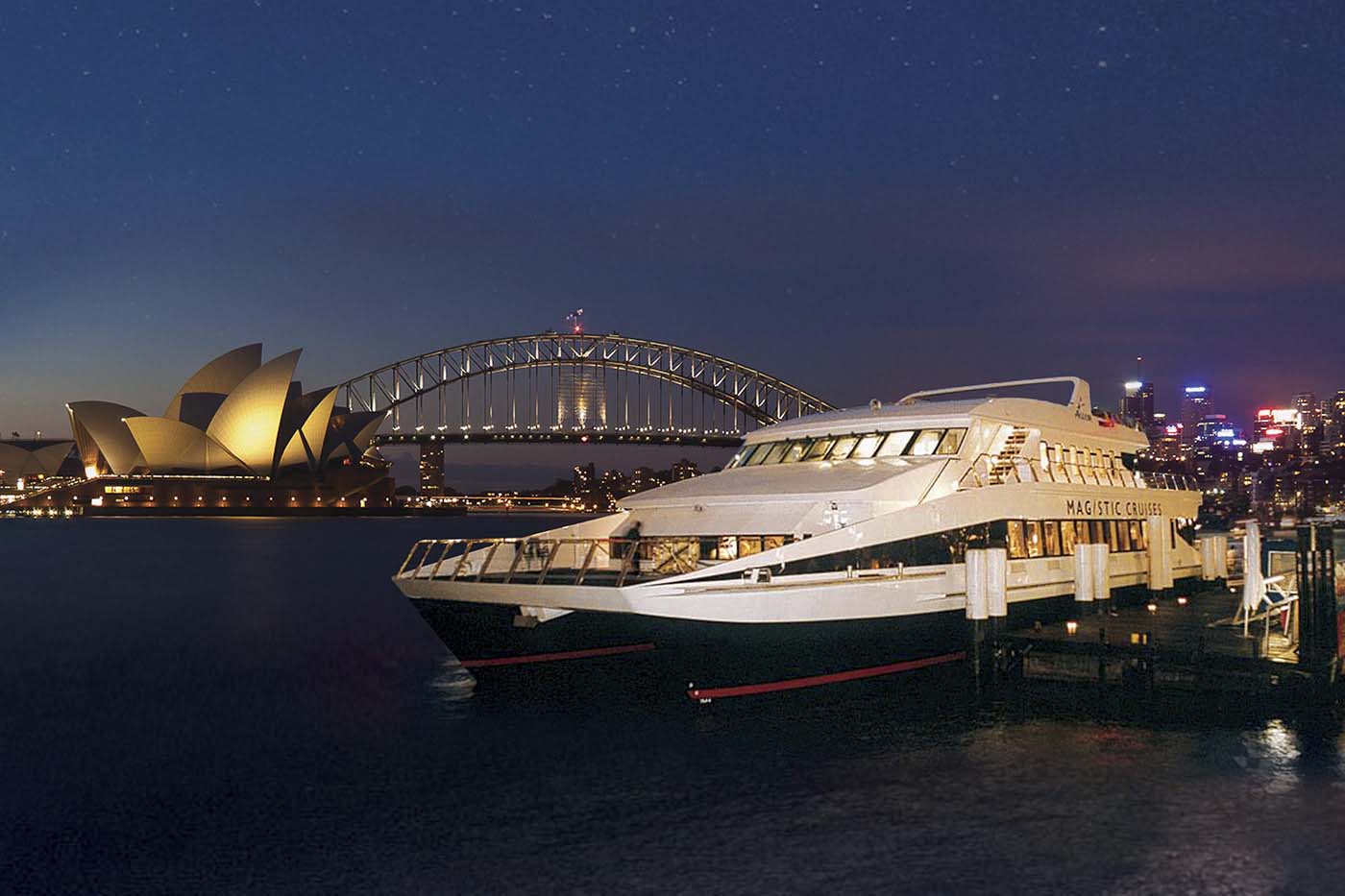 The ‘Magistic Two’ catamaran on Sydney Harbour, with the Opera House and Harbour Bridge in the background