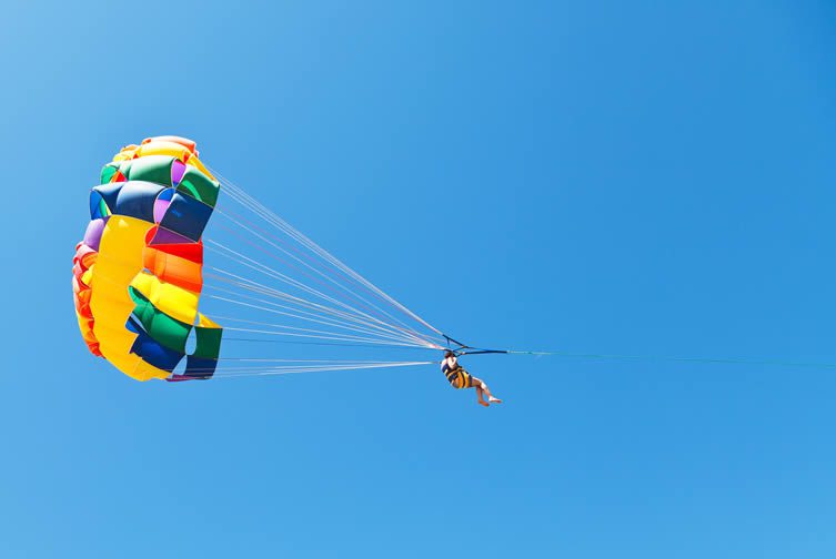 Parasailing over Lake Wanaka in New Zealand